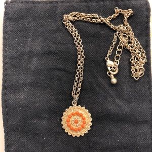 Orange and gold colored necklace